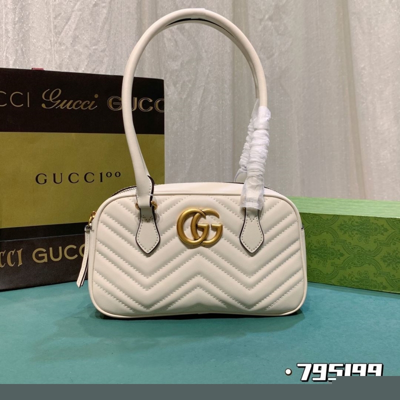 G*u*i top handle bags